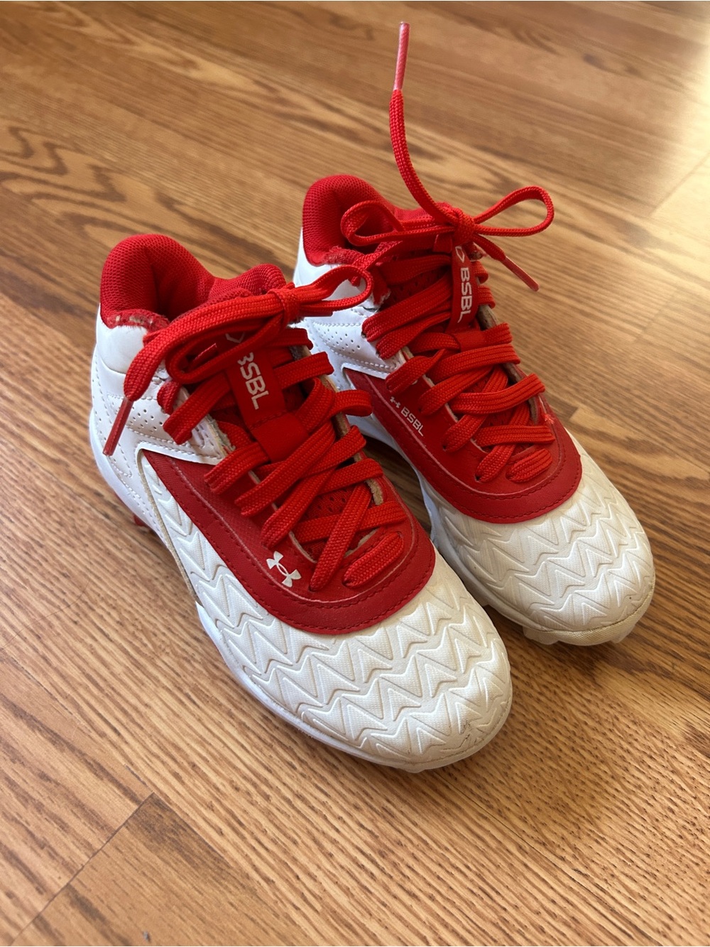 Under Armour Kids Red and White mid cleats